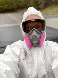 Laure Relihan in Hazmat Gear, preparing to do commercial and disinfectant fogging for Covid-19 in Pittsburgh, PA. Owner of Clean And Pristine.